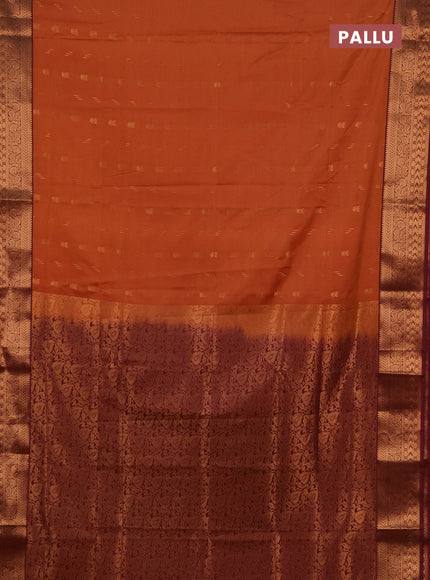 Semi soft silk saree rust shade and wine shade with allover zari woven buttas and zari woven border
