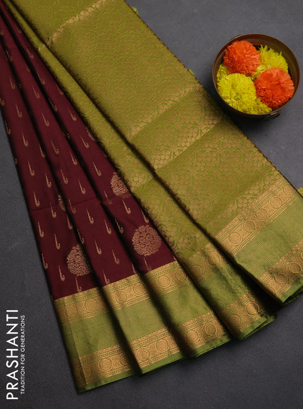 Semi soft silk saree maroon and green with allover zari woven buttas and zari woven border