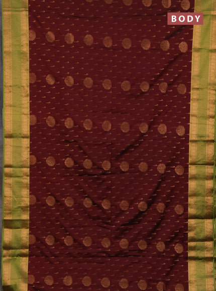 Semi soft silk saree maroon and green with allover zari woven buttas and zari woven border