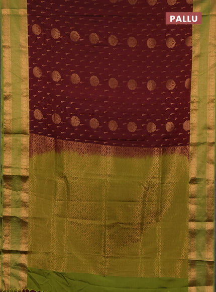 Semi soft silk saree maroon and green with allover zari woven buttas and zari woven border