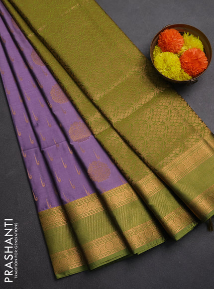Semi soft silk saree pastel purple and green with allover zari woven buttas and zari woven border