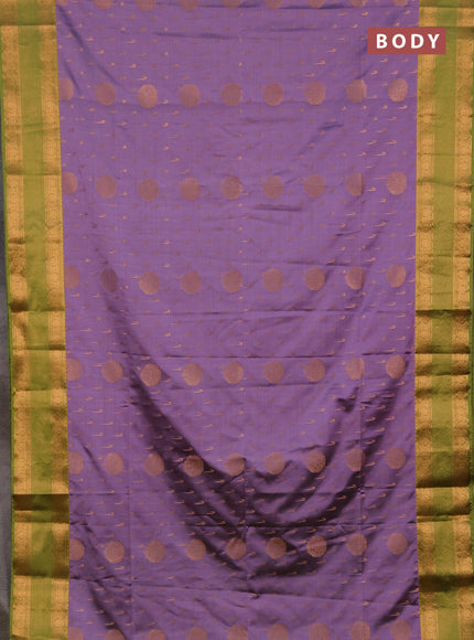 Semi soft silk saree pastel purple and green with allover zari woven buttas and zari woven border