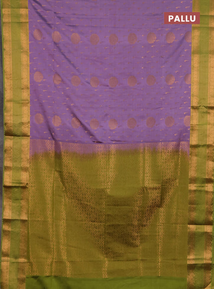 Semi soft silk saree pastel purple and green with allover zari woven buttas and zari woven border