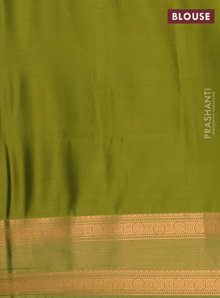 Semi soft silk saree maroon shade and green with allover zari woven buttas and zari woven border