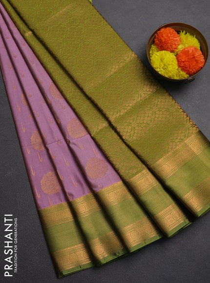 Semi soft silk saree pastel pink and green with allover zari woven buttas and zari woven border