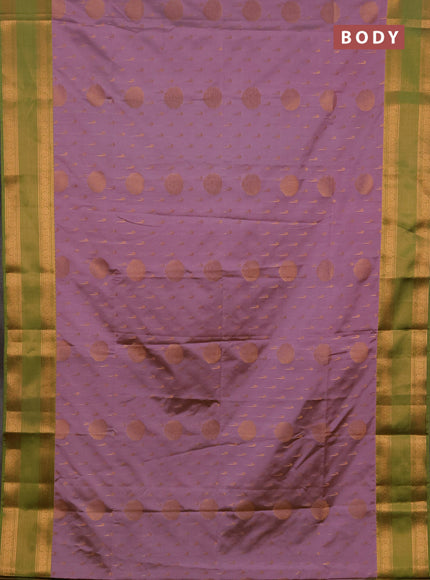 Semi soft silk saree pastel pink and green with allover zari woven buttas and zari woven border