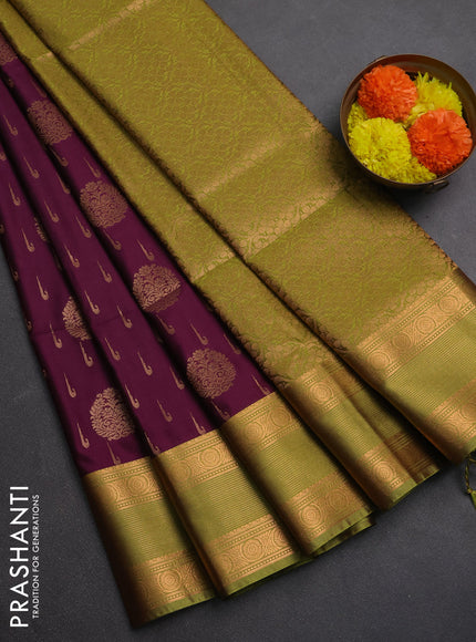 Semi soft silk saree wine shade and green with allover zari woven buttas and zari woven border