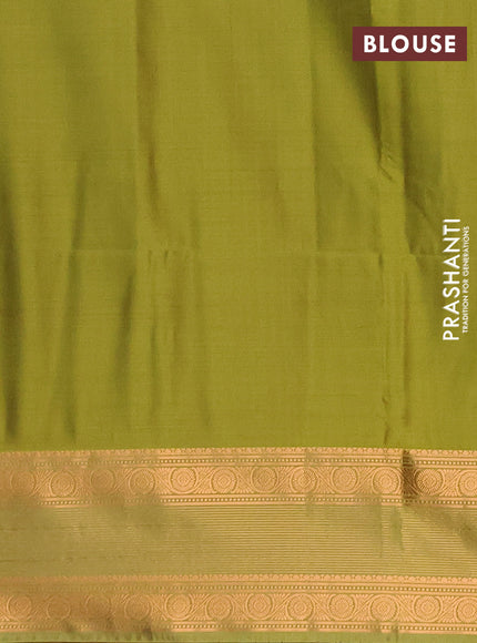 Semi soft silk saree wine shade and green with allover zari woven buttas and zari woven border