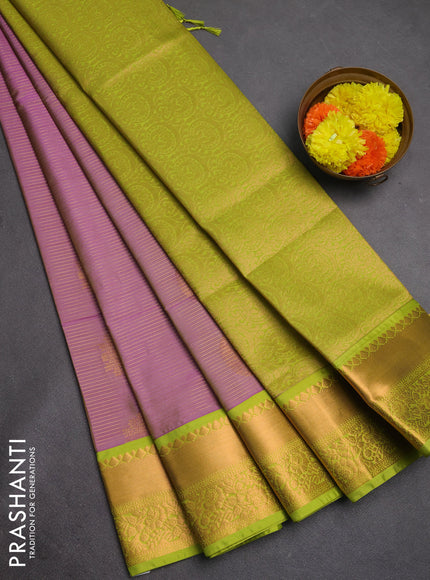 Semi soft silk saree dual shade of purple and light green with allover zari weaves & buttas and rich zari woven border