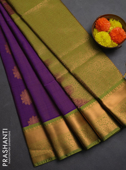 Semi soft silk saree purple and green with allover zari weaves & buttas and rich zari woven border