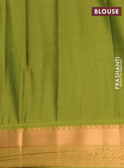 Semi soft silk saree purple and green with allover zari weaves & buttas and rich zari woven border