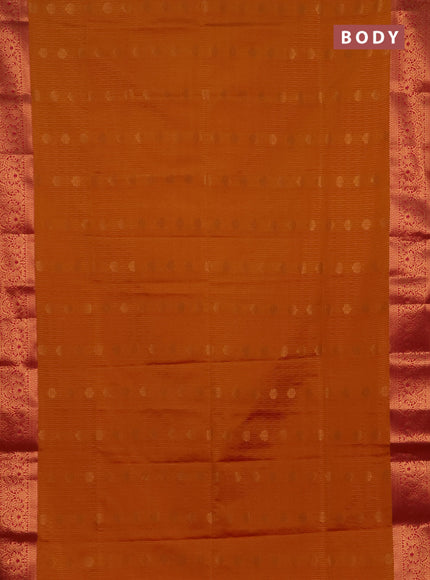 Semi soft silk saree rustic orange and pink with allover zari weaves & buttas and zari wovne border