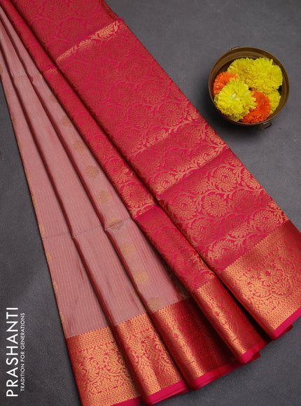 Semi soft silk saree peach shade and pink with allover zari weaves & buttas and zari wovne border