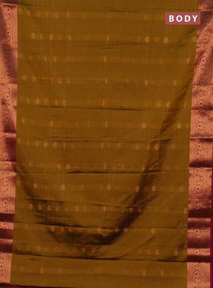 Semi soft silk saree mustard green and magenta pink with allover zari weaves & buttas and zari wovne border