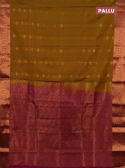 Semi soft silk saree mustard green and magenta pink with allover zari weaves & buttas and zari wovne border