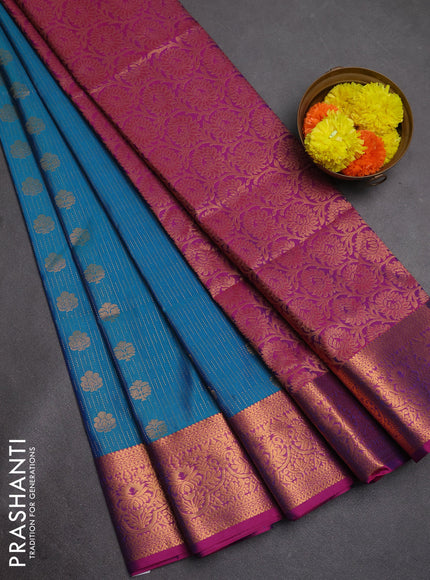 Semi soft silk saree teal blue and purple with allover zari weaves & buttas and zari wovne border
