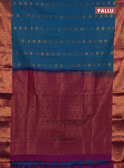 Semi soft silk saree teal blue and purple with allover zari weaves & buttas and zari wovne border