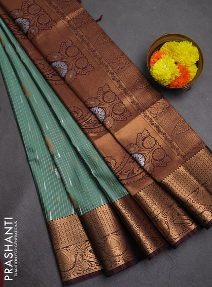 Semi soft silk saree green shade and deep wine with allover silver & gold zari stripes & buttas and zari woven border