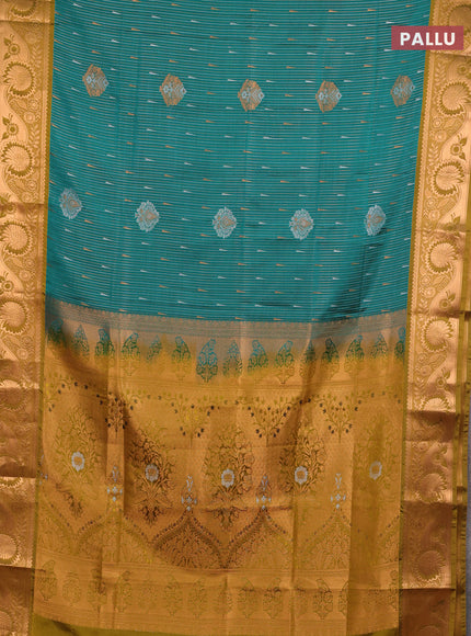 Semi soft silk saree teal green and mustard green with allover silver & gold zari stripes & buttas and zari woven border