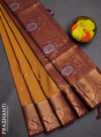 Semi soft silk saree mustard yellow and maroon with allover silver & gold zari stripes & buttas and zari woven border