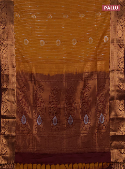Semi soft silk saree mustard yellow and maroon with allover silver & gold zari stripes & buttas and zari woven border