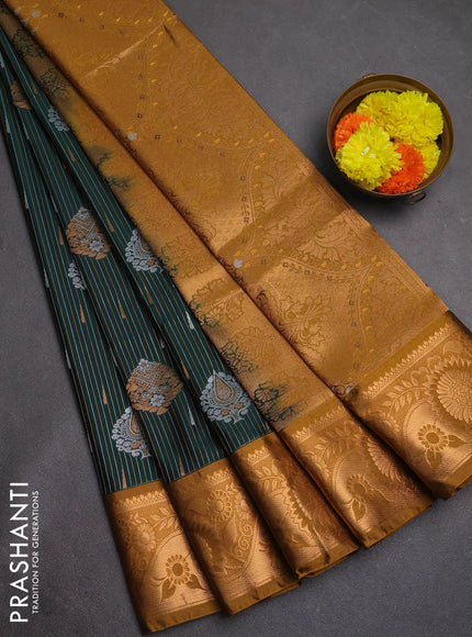 Semi soft silk saree bottle green and dark mustard with allover silver & gold zari stripes & buttas and zari woven border