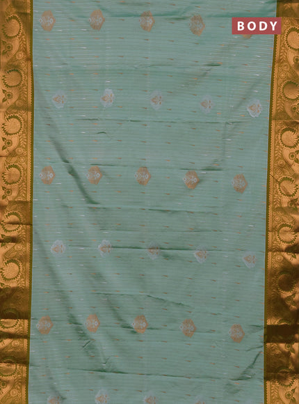 Semi soft silk saree pastel green and lime green with allover silver & gold zari stripes & buttas and zari woven border