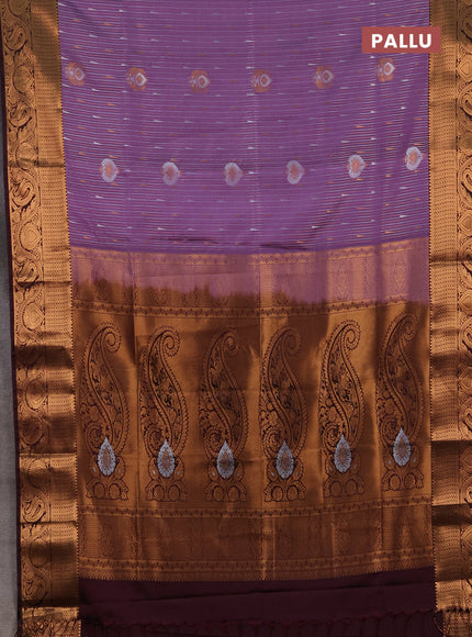 Semi soft silk saree pastel purple and deep wine with allover silver & gold zari stripes & buttas and zari woven border