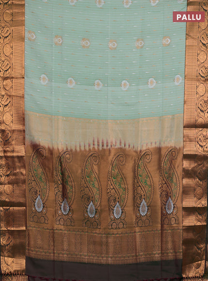 Semi soft silk saree pastel green and bottle green with allover silver & gold zari stripes & buttas and zari woven border