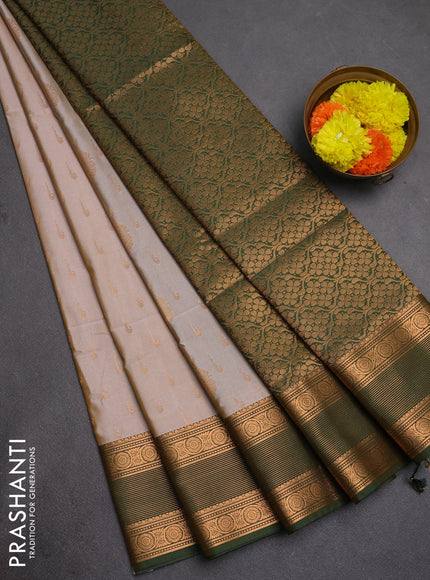 Semi soft silk saree grey and bottle green with allover zari woven buttas and zari woven border