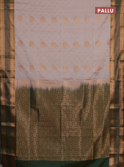 Semi soft silk saree grey and bottle green with allover zari woven buttas and zari woven border