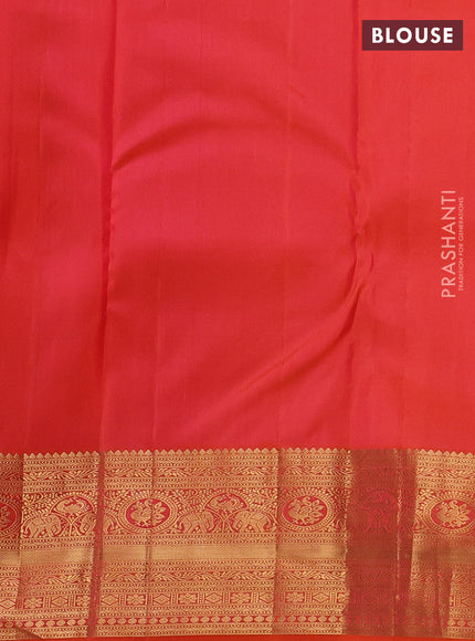 Pure kanchipuram silk saree dual shade of orange with allover zari woven brocade weaves and rich zari woven border