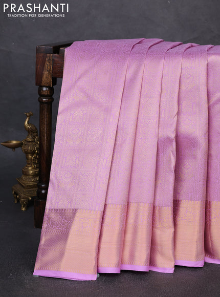 Pure kanchipuram silk saree lavender with allover zari woven brocade weaves and rich zari woven border