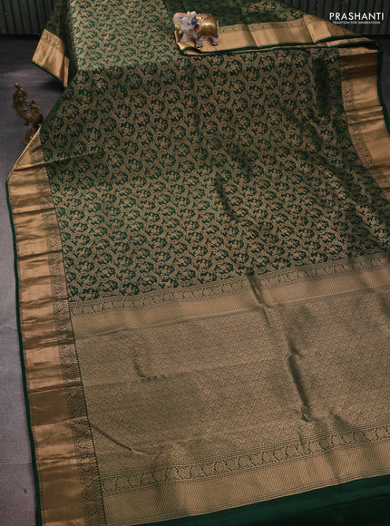 Pure kanchipuram silk saree bottle green with allover zari woven brocade weaves and rich zari woven border