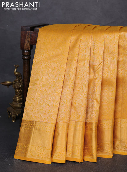 Pure kanchipuram silk saree mustard yellow with allover zari woven brocade weaves and rich zari woven border