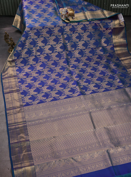 Pure kanchipuram silk saree dual shade of blue with allover zari woven brocade weaves and rich zari woven border