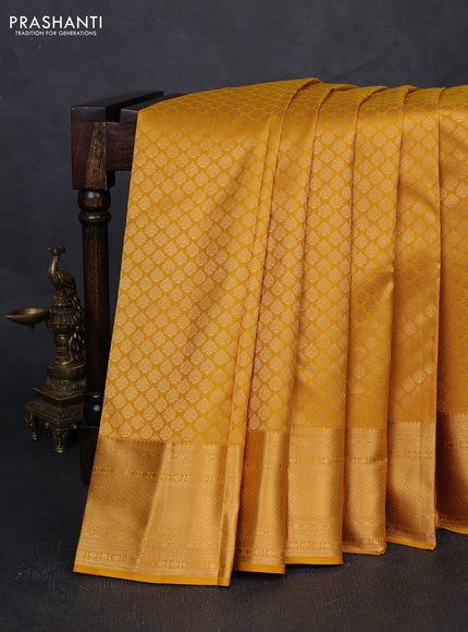 Pure kanchipuram silk saree mustard yellow with allover zari woven brocade weaves and rich zari woven border