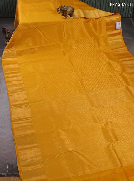 Pure kanchipuram silk saree mustard yellow with allover zari woven brocade weaves and rich zari woven border
