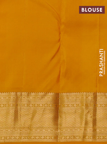 Pure kanchipuram silk saree mustard yellow with allover zari woven brocade weaves and rich zari woven border