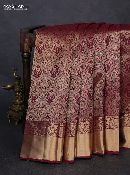 Pure kanchipuram silk saree wine shade with allover zari woven brocade weaves and rich zari woven border