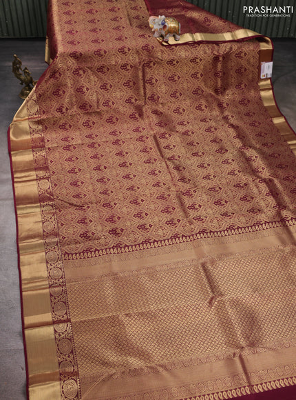 Pure kanchipuram silk saree wine shade with allover zari woven brocade weaves and rich zari woven border