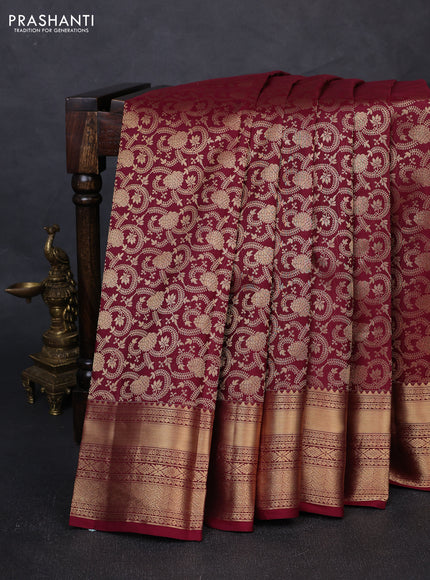 Pure kanchipuram silk saree wine shade with allover zari woven brocade weaves and rich zari woven border