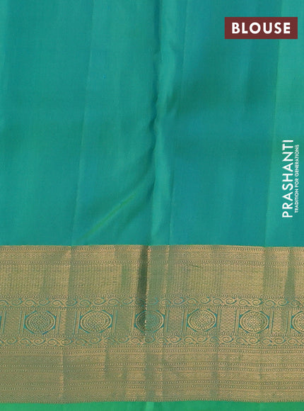 Pure kanchipuram silk saree teal bluish green with allover zari woven brocade weaves and rich zari woven border