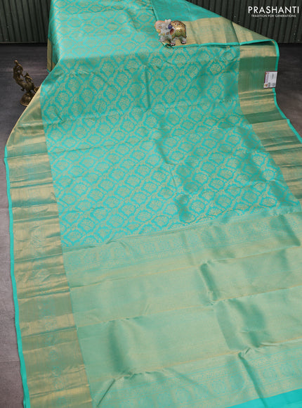 Pure kanchipuram silk saree teal green with allover zari woven brocade weaves and rich zari woven border