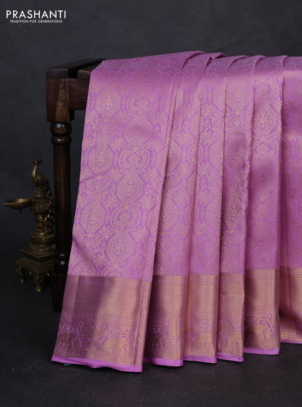Pure kanchipuram silk saree lavender with allover zari woven brocade weaves and rich zari woven border