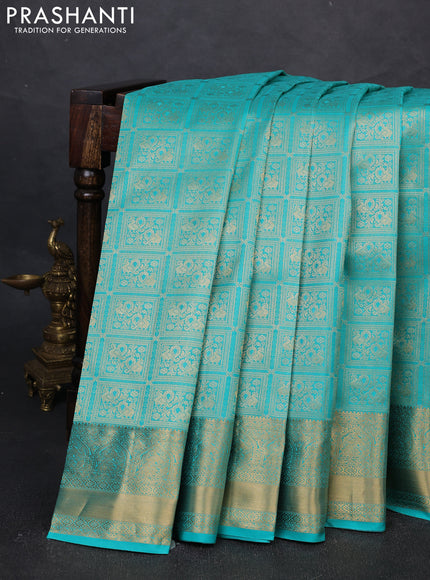 Pure kanchipuram silk saree teal blue with allover zari woven brocade weaves and rich zari woven border