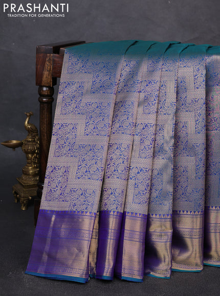 Pure kanchipuram silk saree dual shade of bluish green with allover zari woven brocade weaves and rich zari woven border