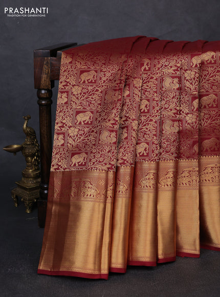 Pure kanchipuram silk saree deep maroon with allover zari woven brocade weaves and long rich zari woven border