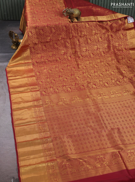 Pure kanchipuram silk saree deep maroon with allover zari woven brocade weaves and long rich zari woven border