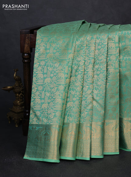 Pure kanchipuram silk saree pastel green with allover zari woven brocade weaves and rich zari woven border